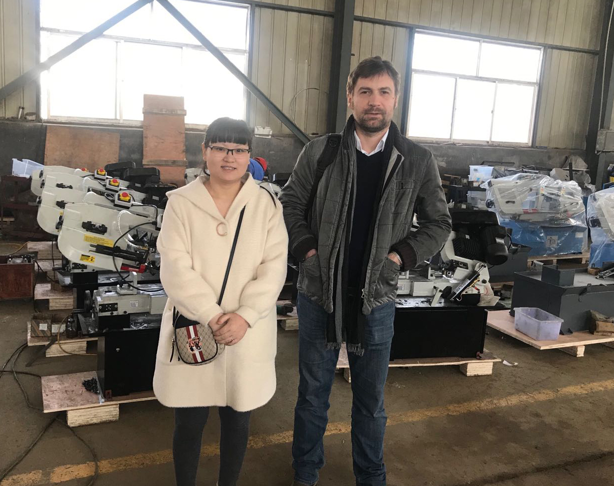 Belarus customer visit our factory and sign sawing machines